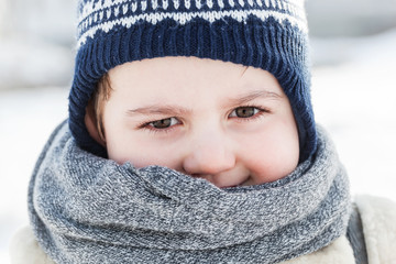 Little boy portrait in winter. Happy child