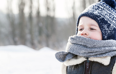 Little boy portrait in winter. Happy child