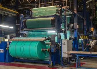 Fototapeta na wymiar Production of glass fiber fabrics