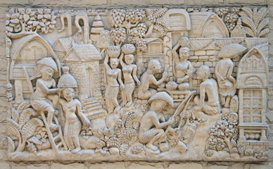 low relief representing life of ancient thai village