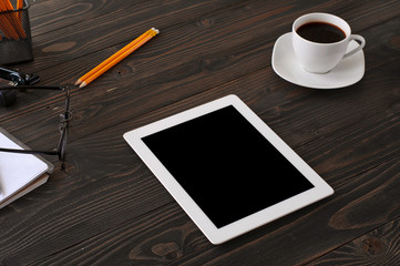 Fototapeta na wymiar White tablet computer with a black screen