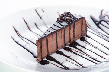 Creamy cream soup with mushrooms and croutons on a white background