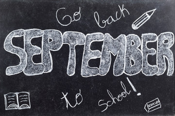 September handwritten on Blackboard