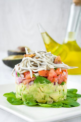 Vegetables and baby eels or elvers tartare

