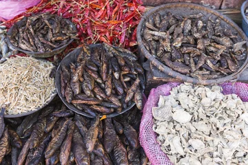 Gordijnen Smoked and dried fish in street of Kathmandu, Nepal © Curioso.Photography