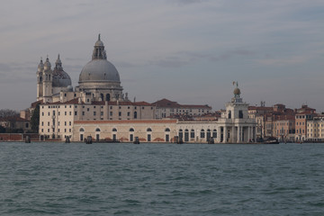 view of the 17th century Basilica of Santa Maria della Salute at the entrance to the Grand Canal, Venice, Italy