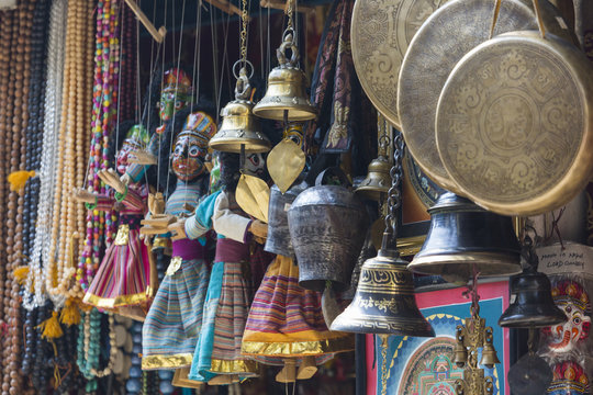 Masks, dolls and souvenirs in street shop at Durbar Square in Ka