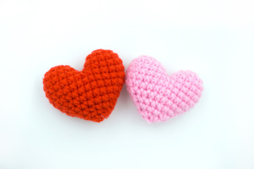 Heart made from yarn on a white background.