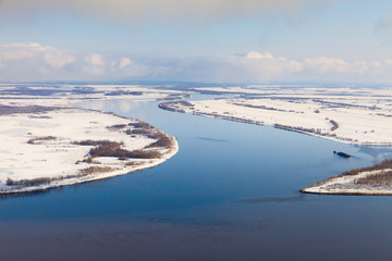 Ship on the river in winter, top view