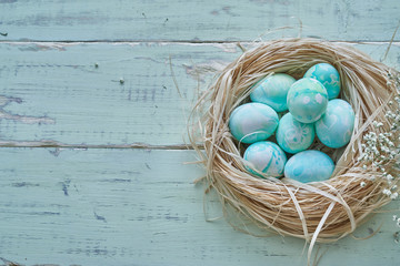 Easter eggs composition in watercolor style - nest via table view