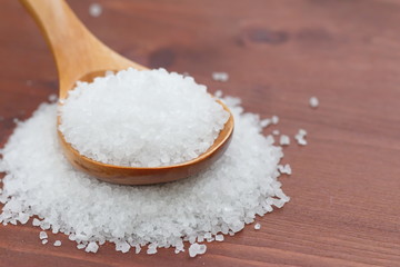 Fototapeta na wymiar Salt in wooden spoon