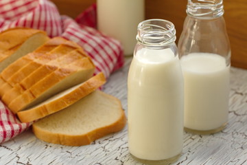 Milk and sliced wheat bread