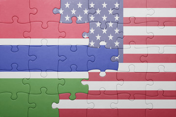 Fototapeta na wymiar puzzle with the national flag of united states of america and gambia