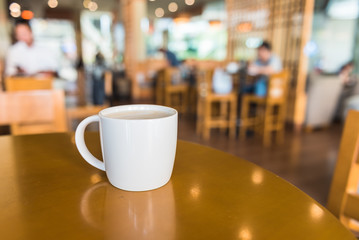 white coffee cup in coffee shop