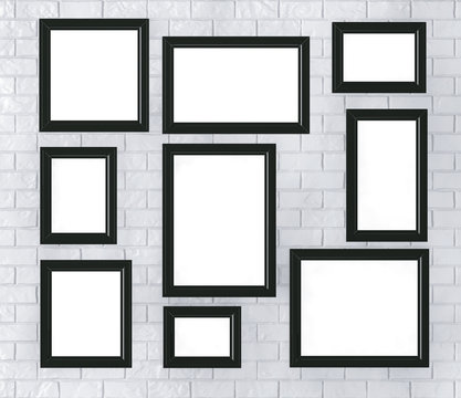 Black Picture Frames on a Brick Wall