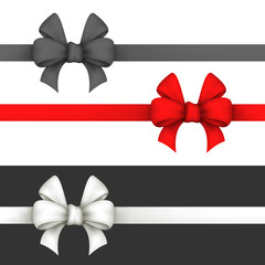Black, red and white gift bows.