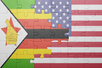 puzzle with the national flag of united states of america and  zimbabwe