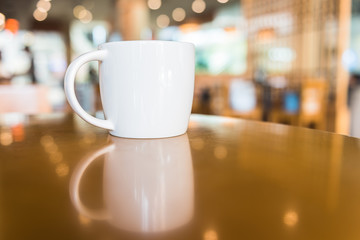 white coffee cup in coffee shop