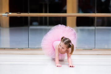 Little ballerina at ballet class © famveldman