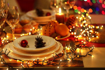 Christmas table setting with holiday decorations