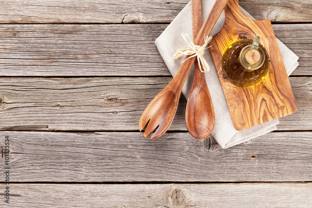 Poster Cooking utensils and olive oil on wooden table