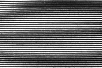 background texture of corrugated cardboard. Black and white photo. Copy space. Free space for text,