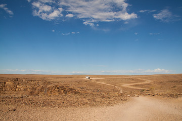 Lonely Tourist Bus in Desert, Namibia