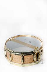 wooden snare drum with gold rims
