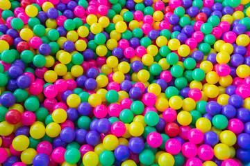 Fototapeta na wymiar Pile of colorful little balls for children to play around