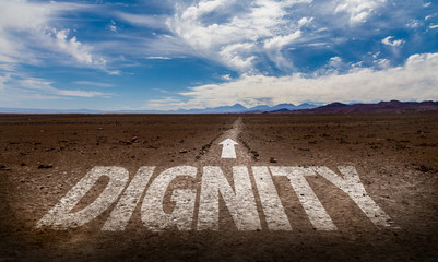 Dignity written on desert road