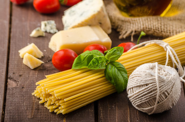 Still life photo, background with pasta and cheese