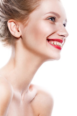 Obraz premium Beautiful woman face. Perfect toothy smile. Caucasian young girl close up portrait. red lips, skin, teeth. Isolated on white background. Studio shot . happy positive girl.
