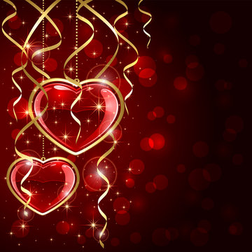 Two red hearts and tinsel