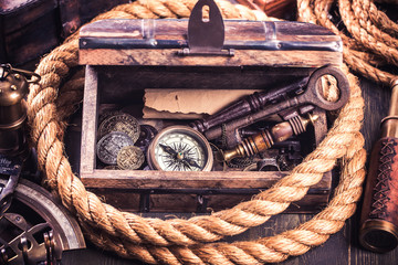 Old wooden box and nautical instruments