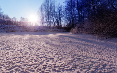 Sunset on the frozen river