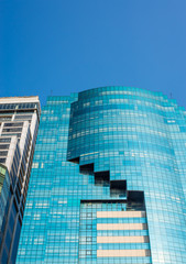 Fototapeta premium Tower glass on blue sky background 