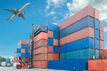 Crane lifter handling container box loading to truck