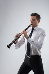 Young man playing the clarinet