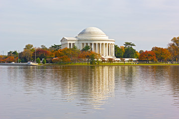 Thomas Jefferson Memorial during autumn in Washington DC. Quiet morning near waters of Tidal Basin in fall.