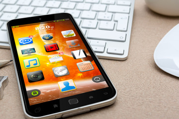 Workplace with modern mobile phone