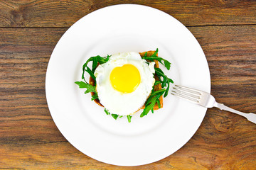 Scrambled Eggs with Arugula on Whole Grain Bread