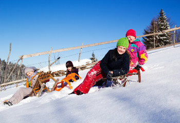 Happy children in winter. Children playing on the snow. Children