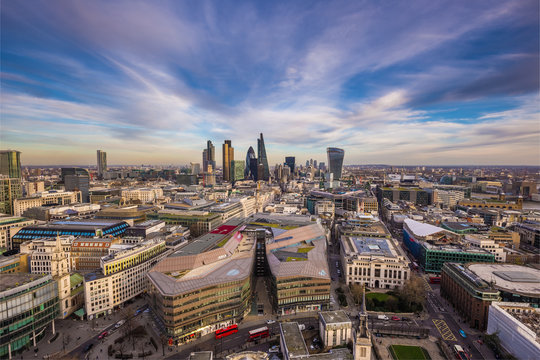 Panoramic skyline of London with Bank district including Stock Exchange Tower, Willis Building, Tower 42, Gherkin, Lloyd`s of London and Canary Wharf at the background.
