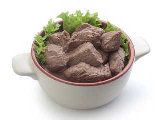 Beef goulash with lettuce in the rural bowl