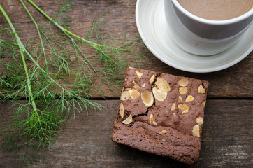 Chocolate brownie with slices nuts