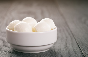 small balls of mozzarella in bowl