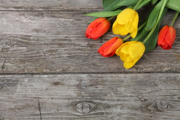 Fototapeta na wymiar Bouquet of yellow and red tulips