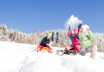 Happy children  at winter time. Group of children spending a nice time in snow
