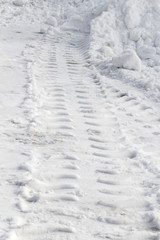 Fototapeta na wymiar Track wheel in the snow