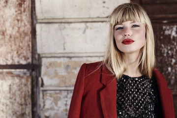 Pretty pouting young blond woman, portrait